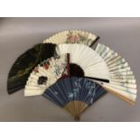 Chinese fans, six, the first featuring a lady at rest in the garden, receiving visitors, the