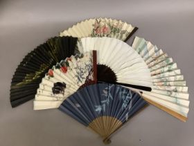 Chinese fans, six, the first featuring a lady at rest in the garden, receiving visitors, the