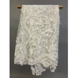 Antique Lace: an elaborate late 19th century Honiton lace wedding veil, the net densely applied with
