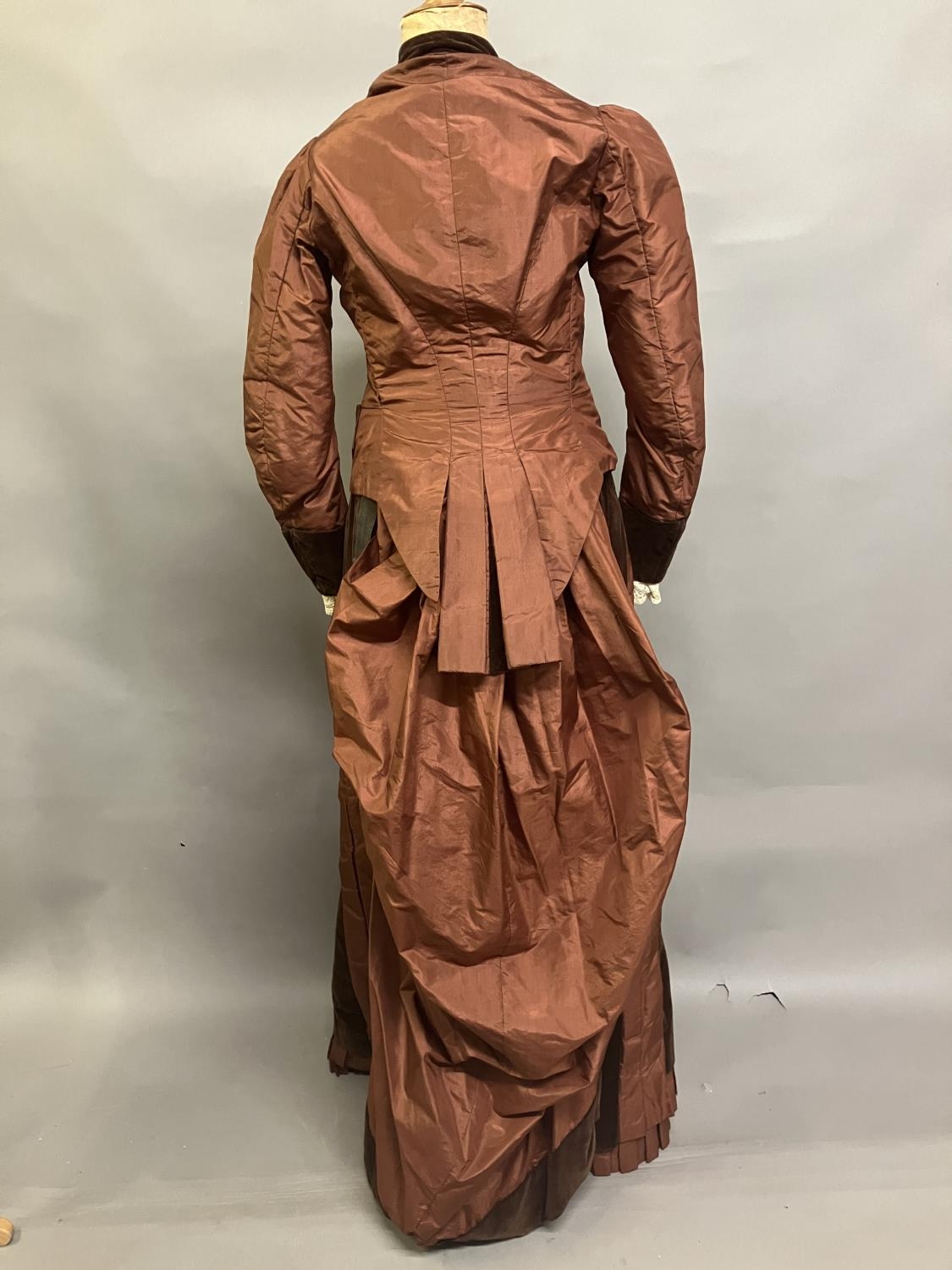 A c 1880’s century two piece costume, mid-brown silk and darker velvet, the bodice with straight - Image 4 of 6