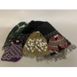 An oversized miser’s purse, in black, embellished with cut steel beads; together with a purple