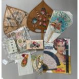 A selection of fans and ephemera: a 19th century greetings card, cut paper, silvered , applied