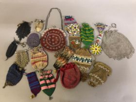 A large quantity of small and varied 19th century coin purses, beaded, some à diable, crocheted in