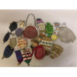 A large quantity of small and varied 19th century coin purses, beaded, some à diable, crocheted in