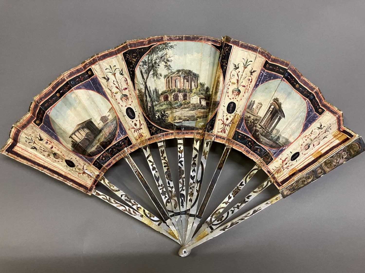 A late 18th century Grand Tour fan, the monture of mother of pearl, gilded, with design to the - Image 2 of 7