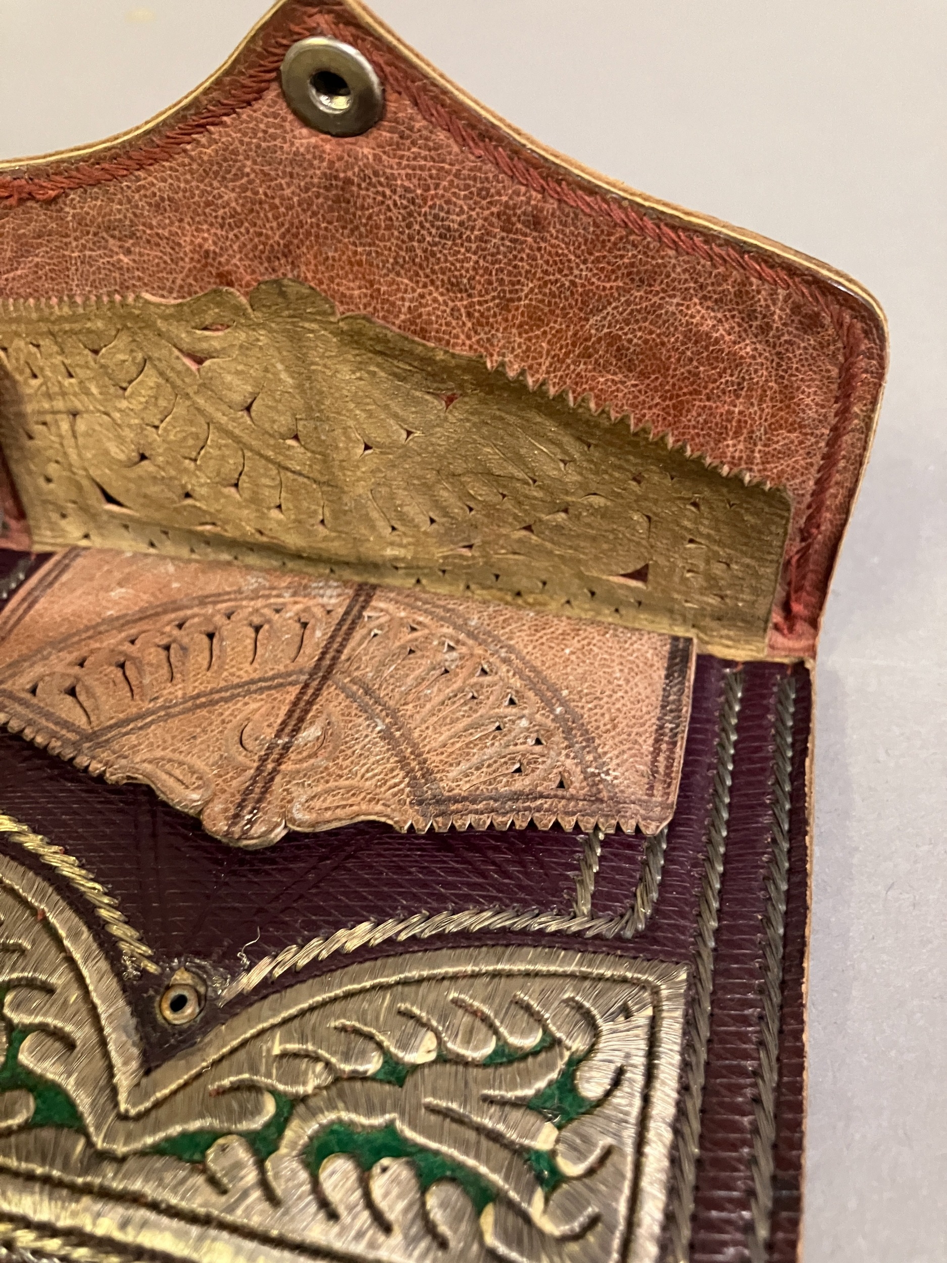 A fine quality Ottoman burgundy leather gentleman’s purse with three compartments, early 19th - Image 4 of 5