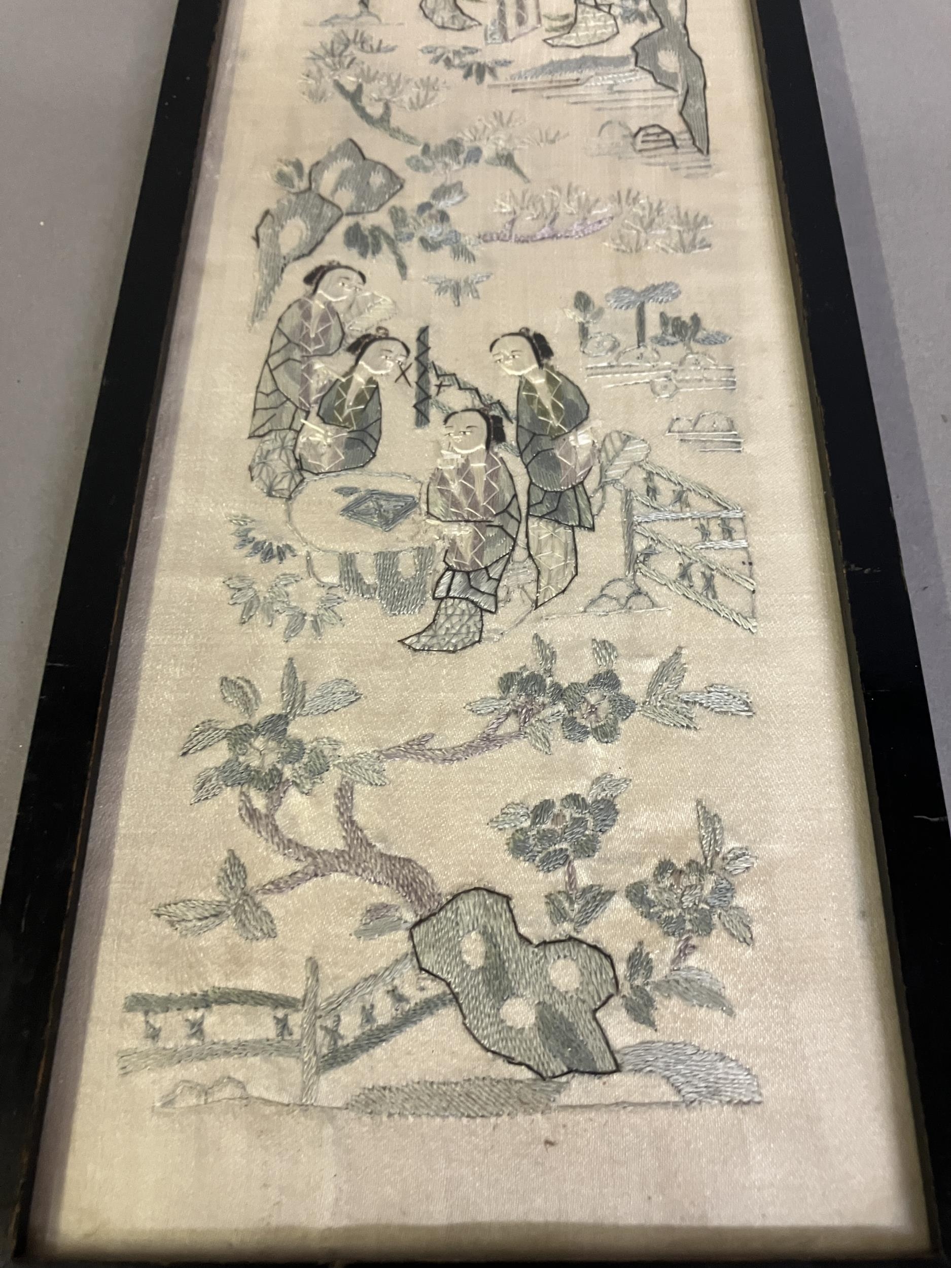 A 19th century embroidered silk Chinese sleeve band, framed and glazed, the cream ground - Image 2 of 5