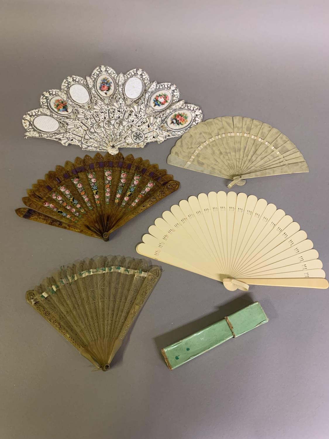 18th to 20th century brisé fans: a c 1820’s tortoiseshell fan with pointed sticks, pierced,