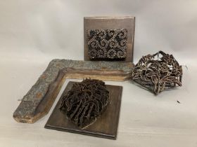 Antique printing blocks An antique metal block for fabric printing, with metal handle, designed as a
