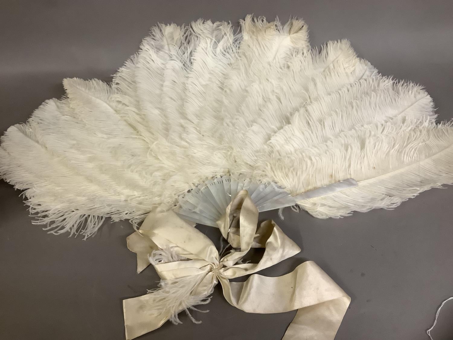 A large and fluffy white ostrich feather fan, the monture of white mother of pearl, fitted with a - Image 4 of 5