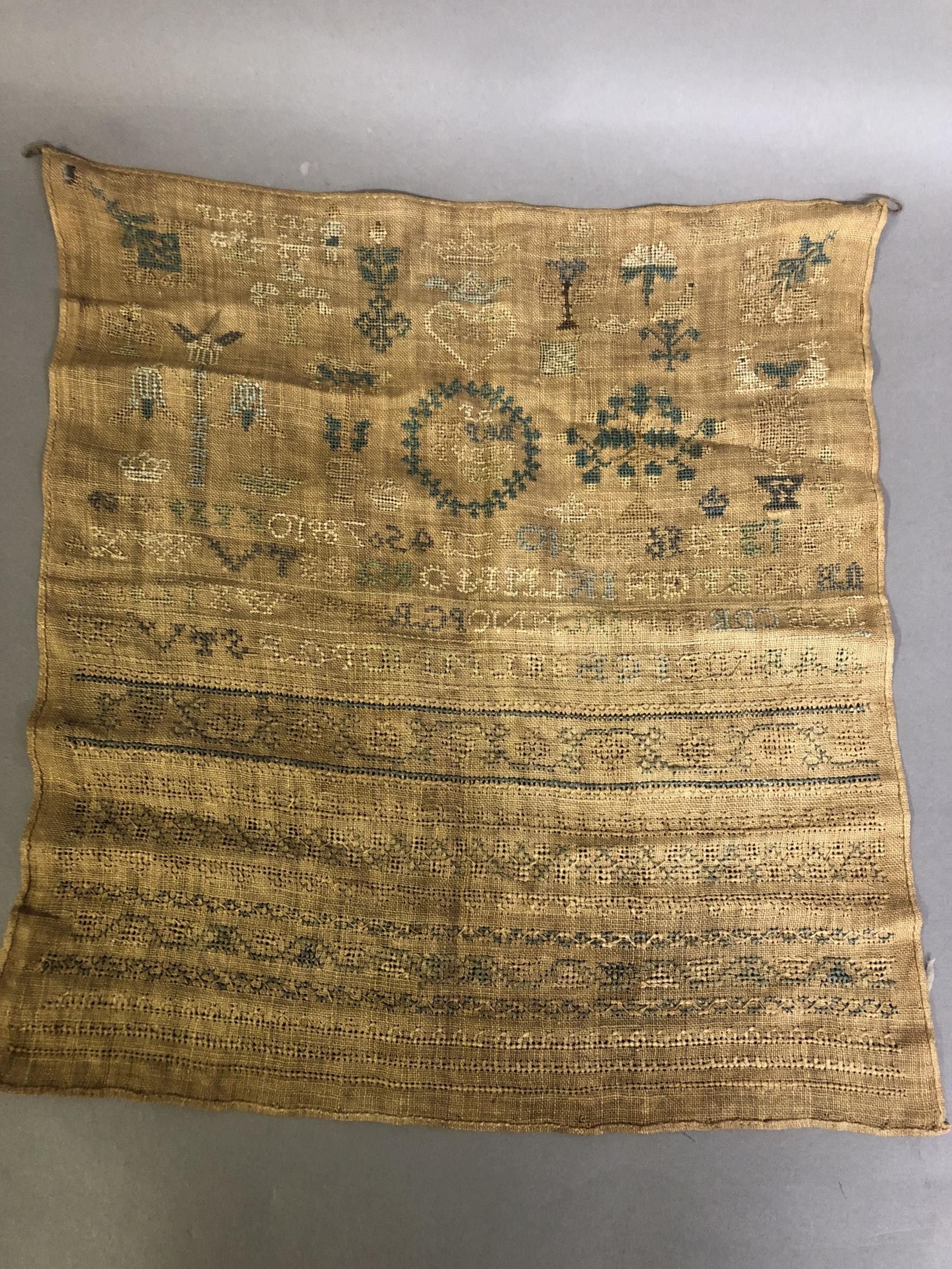Needlework samplers, two, the first in 18th century band sampler form, on linen, worked with more - Image 2 of 2