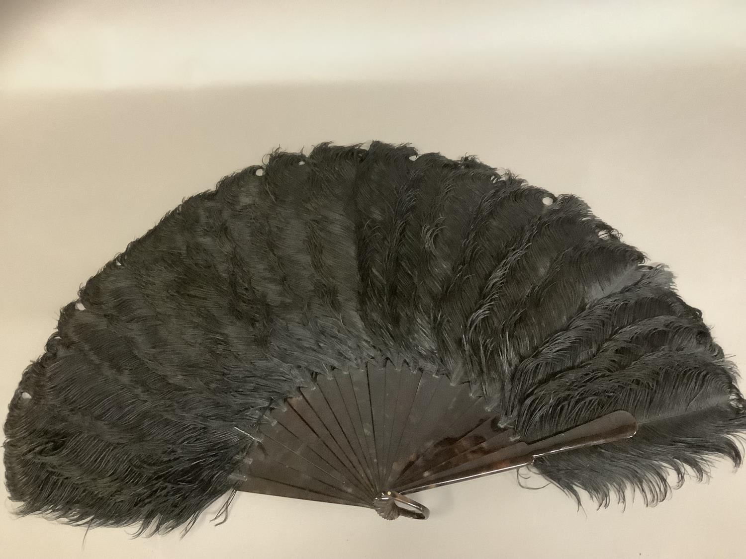 A good black late 19th century ostrich feather fan, the monture of tortoiseshell, with good - Image 2 of 4