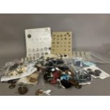 Buttons: an assortment of buttons from tinies to 50’s plastic, various materials to include pearl,