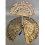 A wood brisé fan of the type produced in Austria and then applied with scraps, in ascending size,