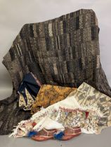World textiles: a shawl of printed cotton batik, a busy design to the centre with larger designs