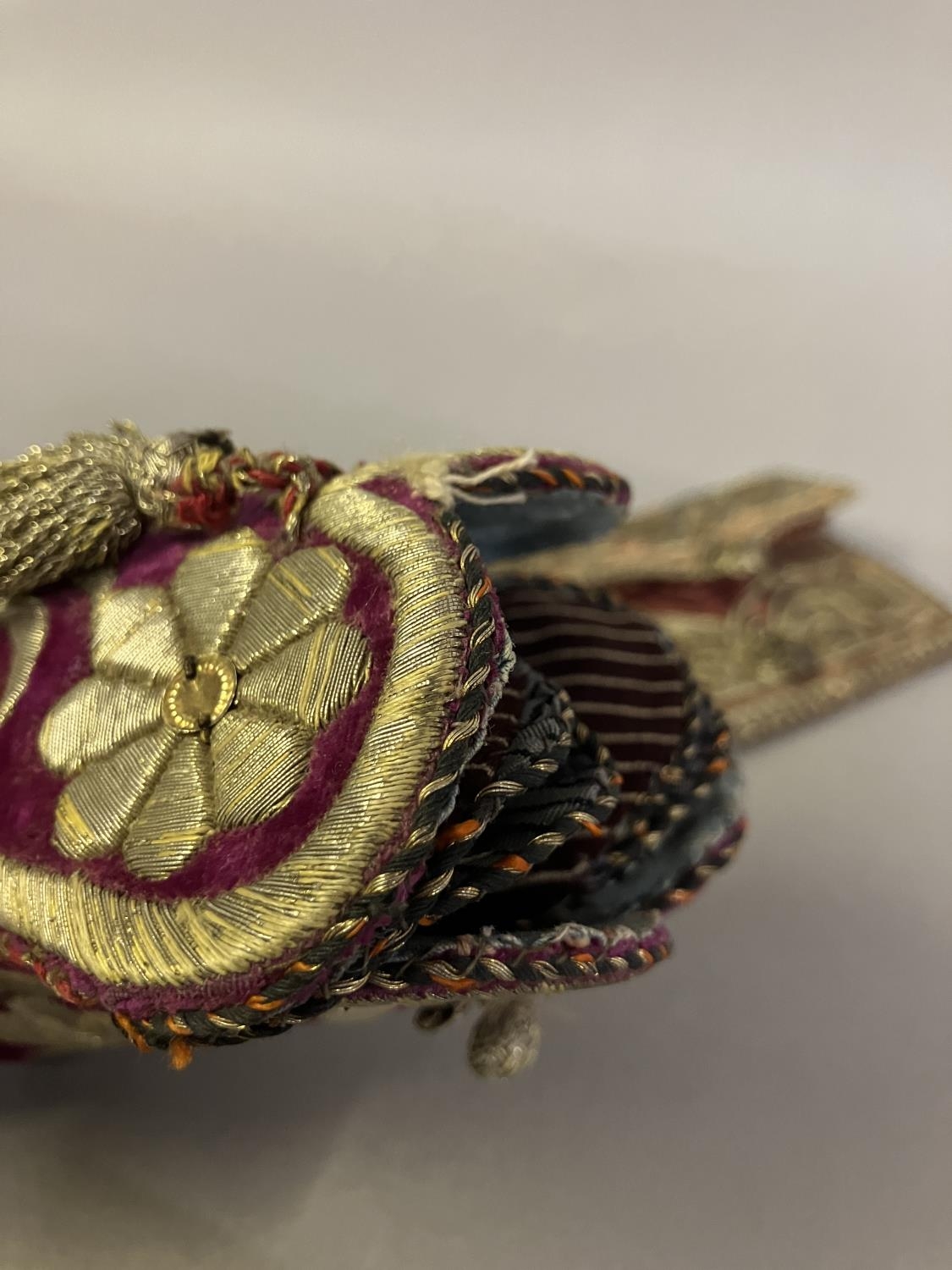 Antique Ottoman purses, two in plum velvet, one in ruby leather, all embroidered in gold: the - Image 5 of 5