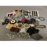 1930’s and earlier buckles, belts, hatpins, dress clips, buttons etc: comprising two diamanté belts,