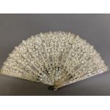 Antique Lace: an early 20th century Maltese silk lace fan, the leaf mounted on pink mother of