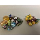 Trade beads: a selection of glass beads, many with floral patterns, to include 10 in a deep