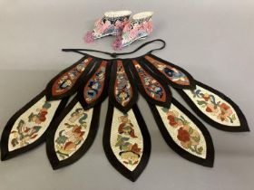 A colourful antique Chinese collar, Quing Dynasty, with silk tie strap, each panel in two sections