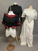 Miscellaneous costume: a mid-19th century boned bodice in eau de nil striped silk, trimmed with