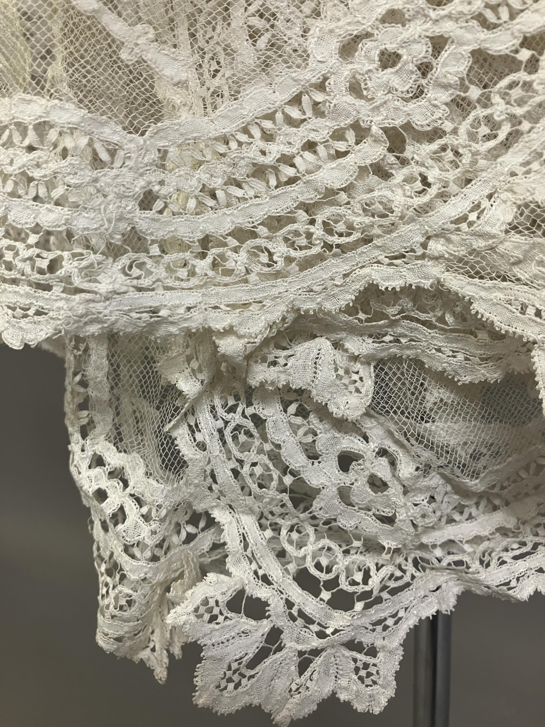 Antique Lace: an elaborate late 19th century Honiton lace wedding veil, the net densely applied with - Image 2 of 4