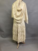 An embroidered Victorian cotton gown currently in partly deconstructed state, the skirt lacking