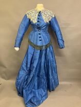 A sky-blue light weight silk two piece ensemble c 1880’s, the tailored long-line bodice with covered