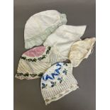 Antique bonnets: a white cotton quilted bonnet, possibly boutis but lined so unable to see the work,