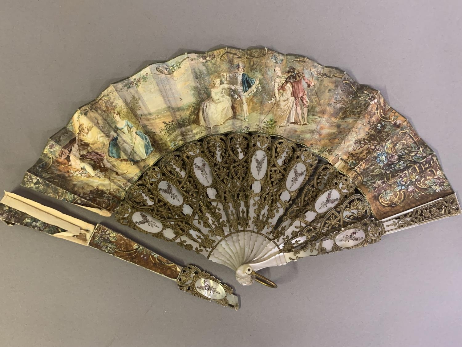 Three 20th century fans: the first, in white mother of pearl, a pastiche of an 18th century fan, the - Image 6 of 9