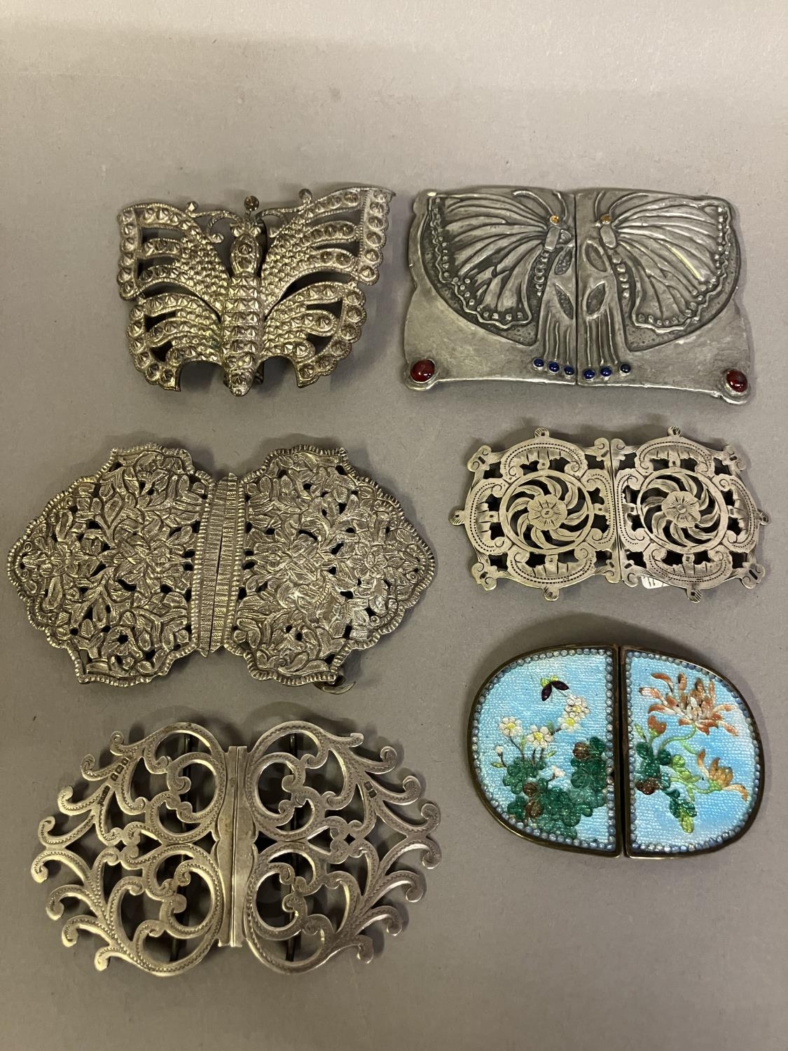Unusual metal buckles, late 19th century/early 20th century, comprising one large buckle, Art