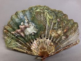 An Art Nouveau fan, in ballon form, the shaped monture of blonde tortoiseshell, note the shapes when