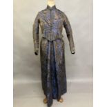A mid-19th century woven silk two-piece ensemble, dark brown with royal blue flowers and a bronze