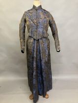 A mid-19th century woven silk two-piece ensemble, dark brown with royal blue flowers and a bronze