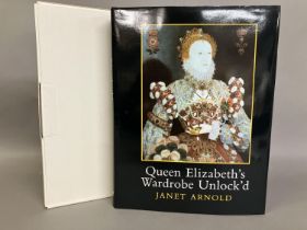 Queen Elizabeth’s wardrobe unlock’d: A large hardback book with protective cardboard sleeve,