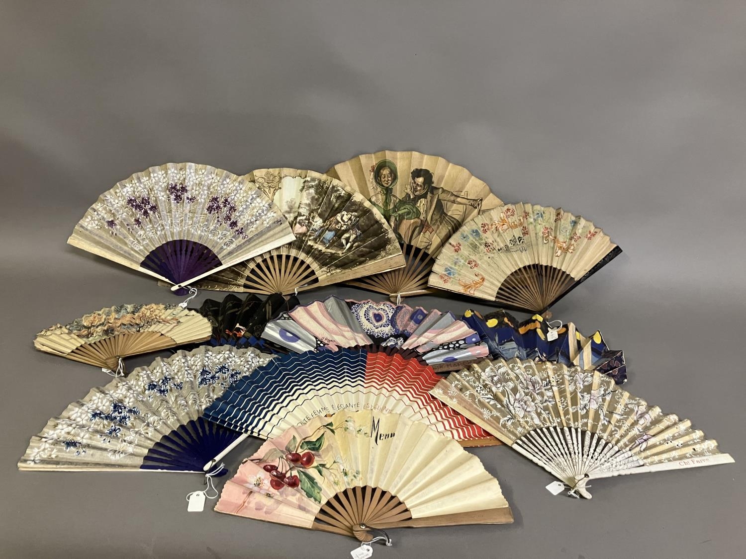 Advertising fans: twelve assorted fans, the first in ballon form advertising Kettner’s Hotel, with