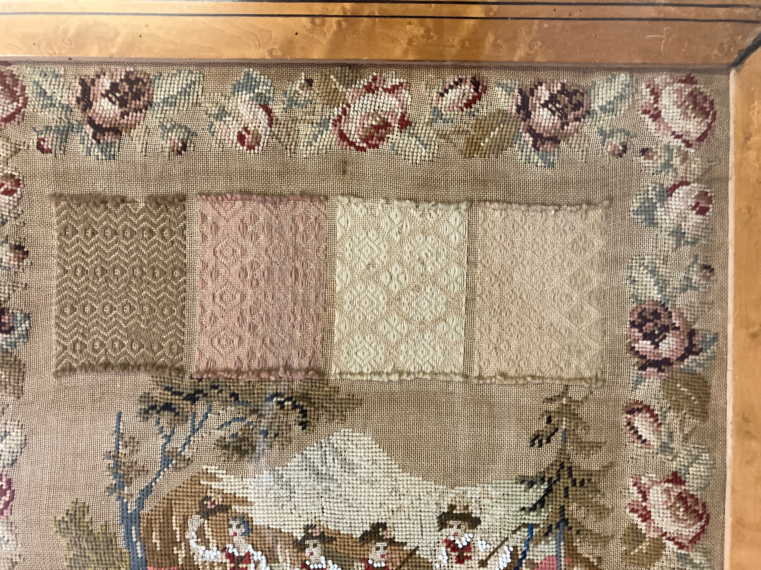 A mid-19th century darning sampler, European, unusual with a mix of darning, woolwork, beadwork, - Image 3 of 5