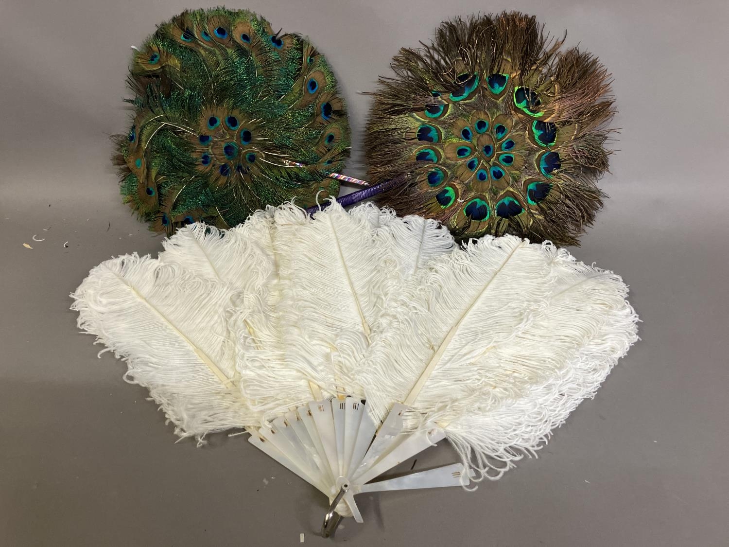 A late 19th century white ostrich feather fan, the monture of white mother of pearl, plain other - Image 2 of 10