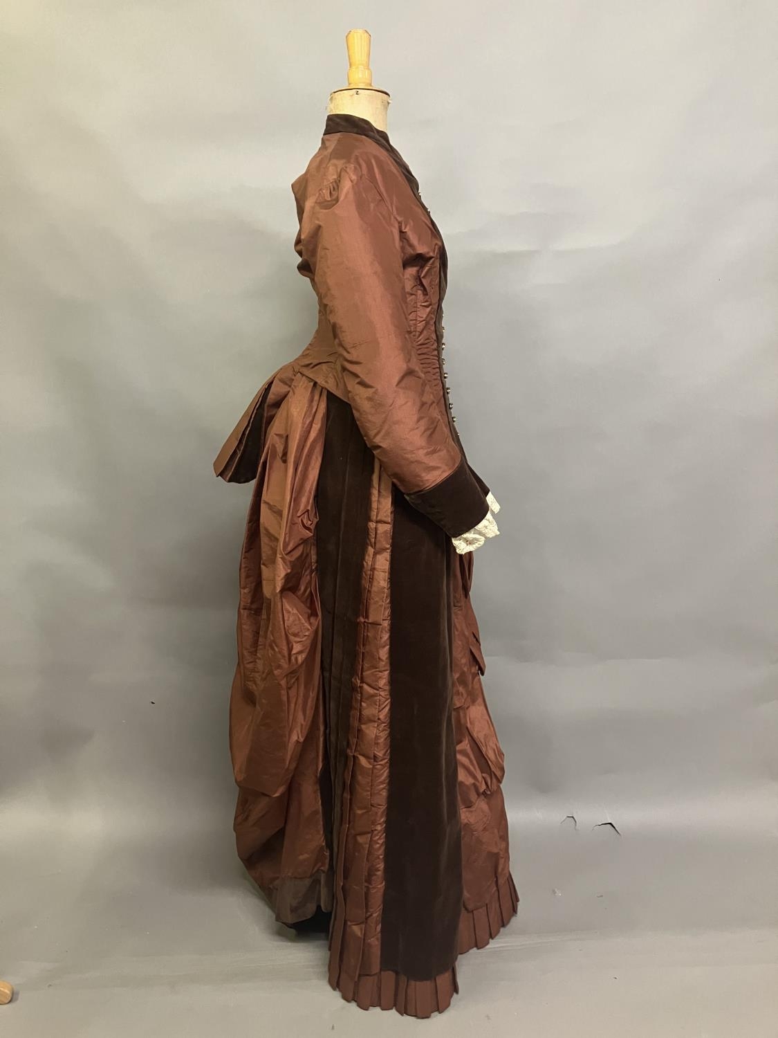 A c 1880’s century two piece costume, mid-brown silk and darker velvet, the bodice with straight - Image 3 of 6