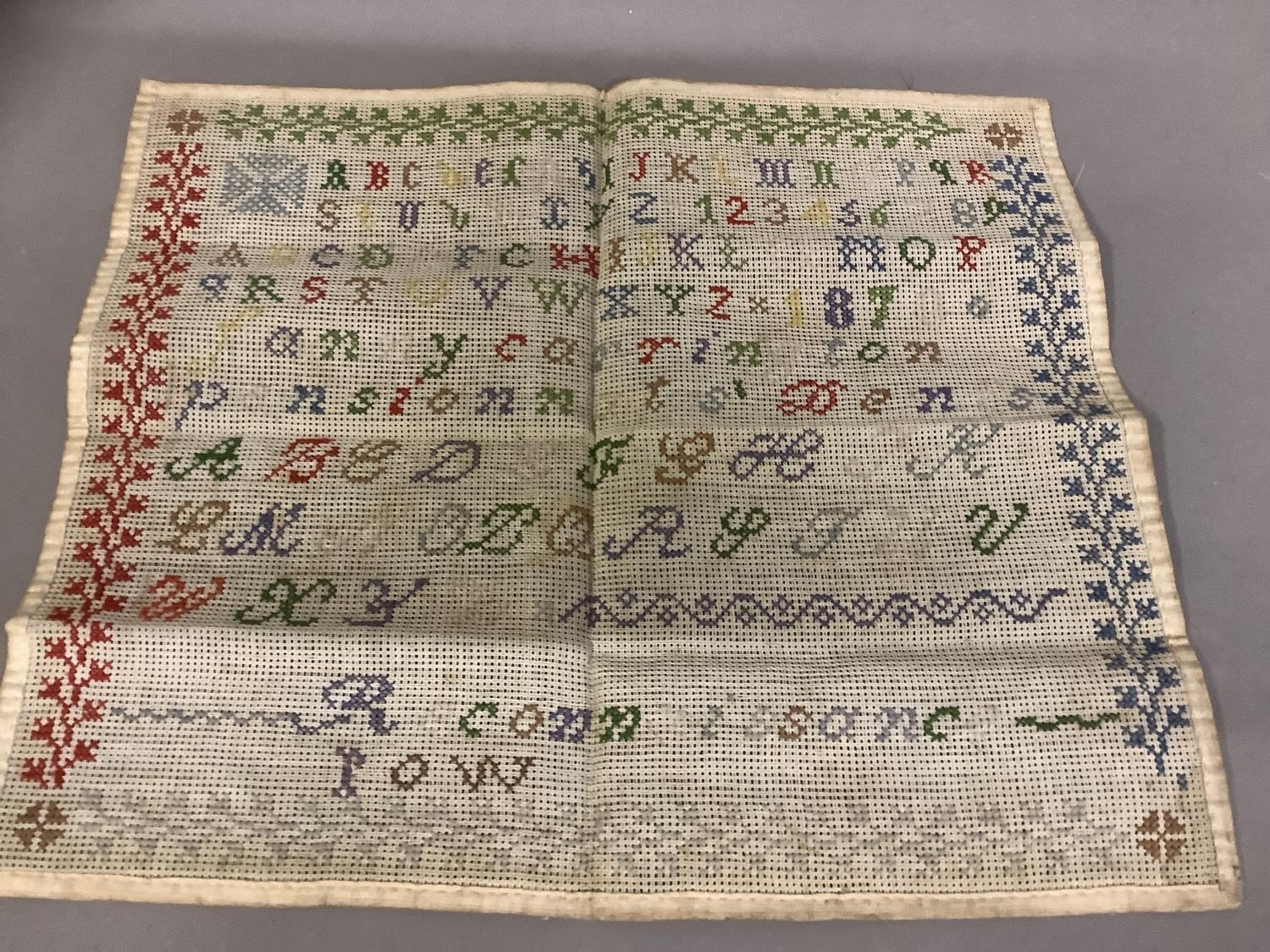 An antique linen band sampler, alpha/numeric, dated 1834; together with a colourful alpha/numeric - Image 2 of 4