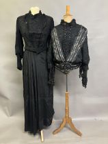 Two Edwardian bodices and a skirt, all in black, none matching, the first bodice in a heavy black