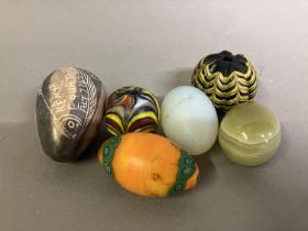 Trade beads: A selection of unusual beads and mineral eggs, comprising a very large black and yellow
