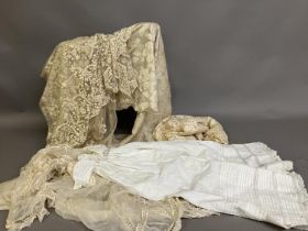 Antique Lace: 19th century to the 1930’s, five items, the first a shoulder cape in cream net, with
