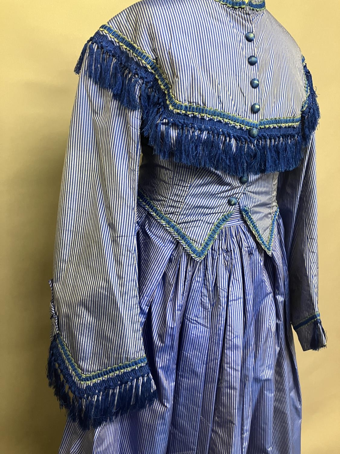 C 1865, a striped blue silk two-piece ensemble, short bodice with rear detail, trimmed with - Bild 2 aus 8