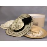 Three stylish Edwardian hats, large, the first in cream cotton, the brim wired, pleated and frilled,