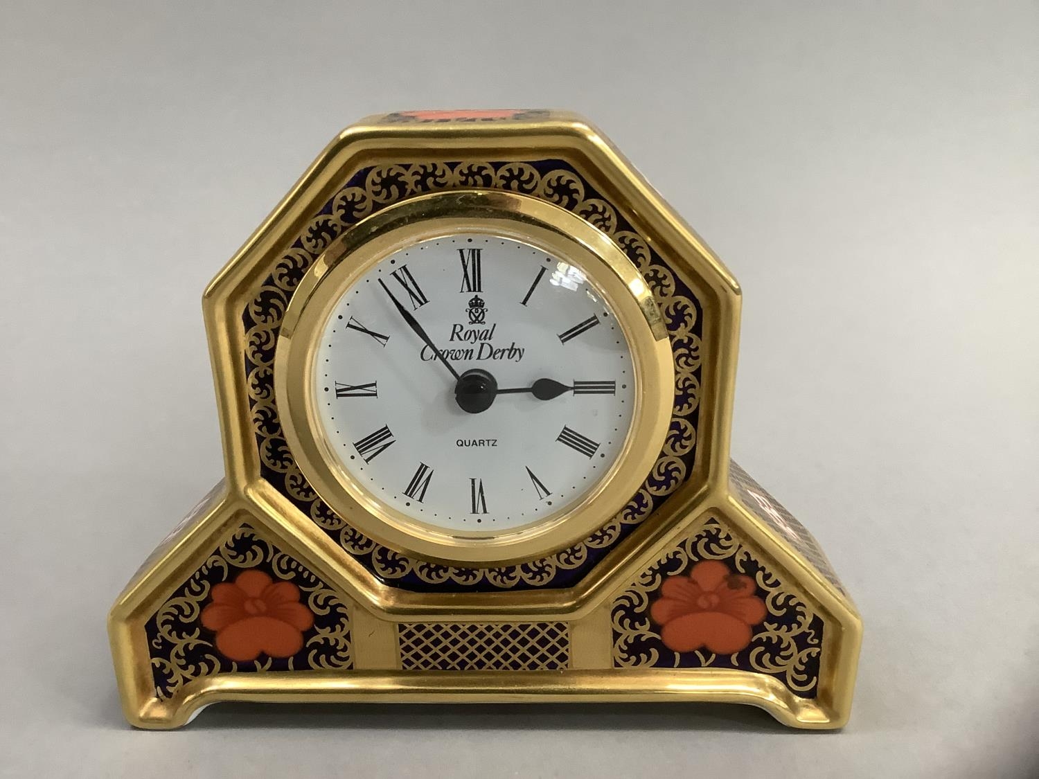 A Royal Crown Derby mantle clock of old Imari pattern 1128 10.5cm high
