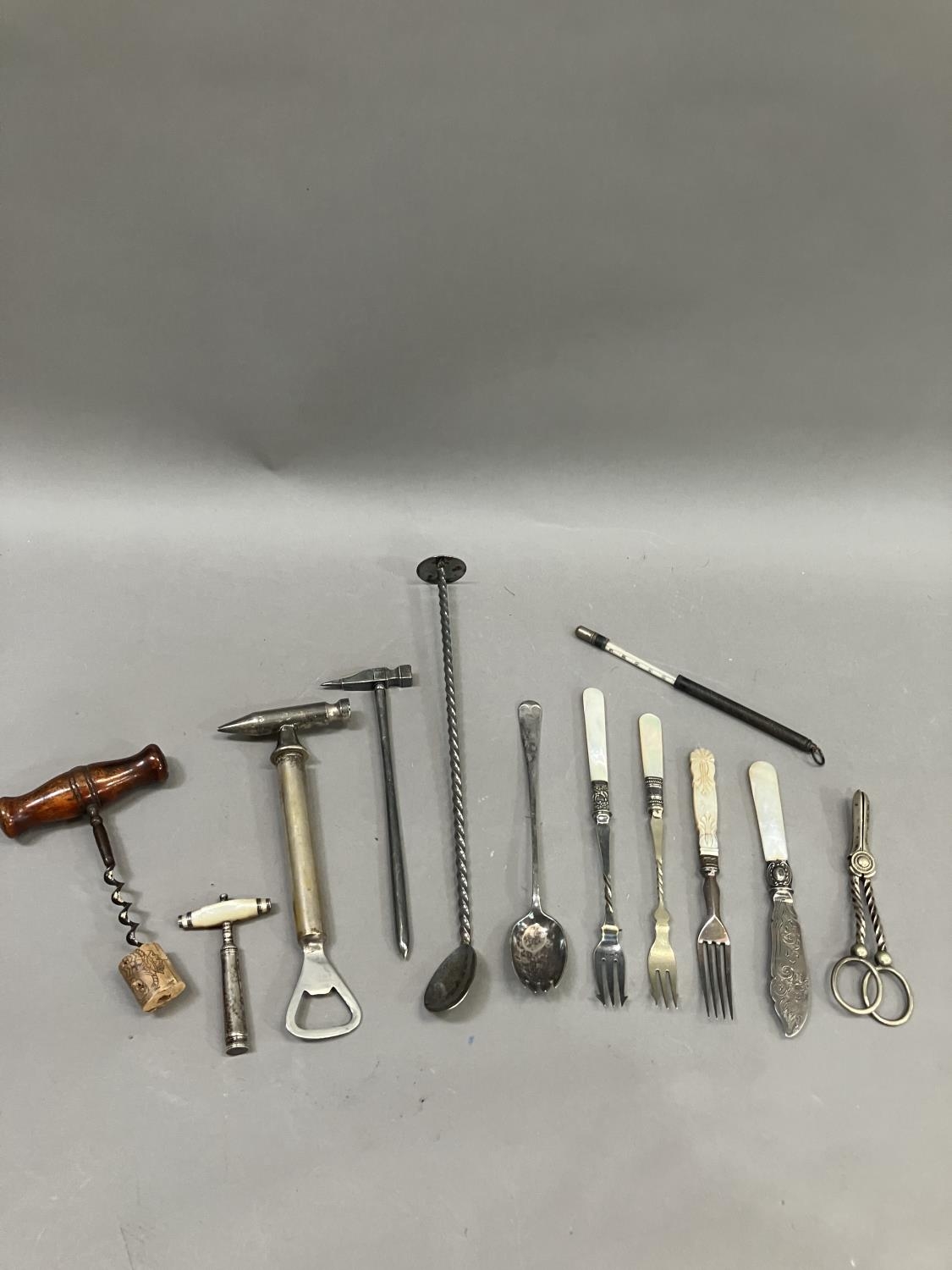 19th century and early 20th century corkscrews including a wooden handled example possibly lignum