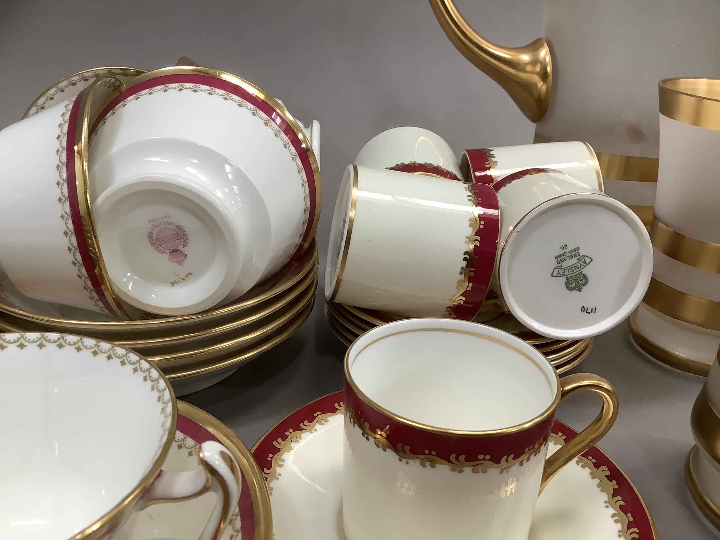 A Minton china tea service bordered in pink and gilt comprising teapot, sugar and milk, eleven cups, - Image 3 of 5