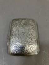 A George V silver cigarette case, Birmingham 1916 for Joseph Gloster, rectangular with rounded