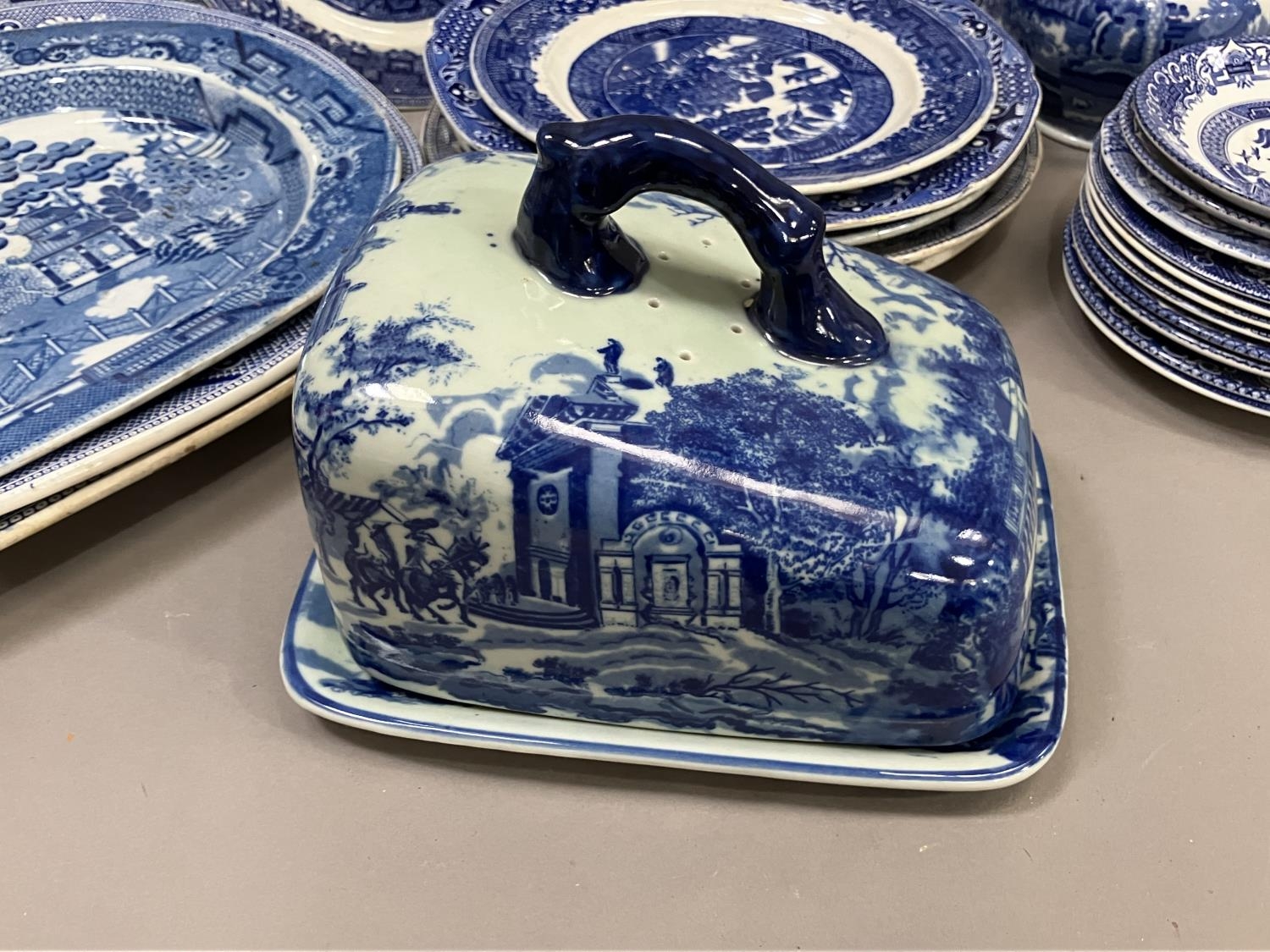 A collection of blue and white ware including four willow pattern meat plates, side plates, dinner - Image 2 of 7